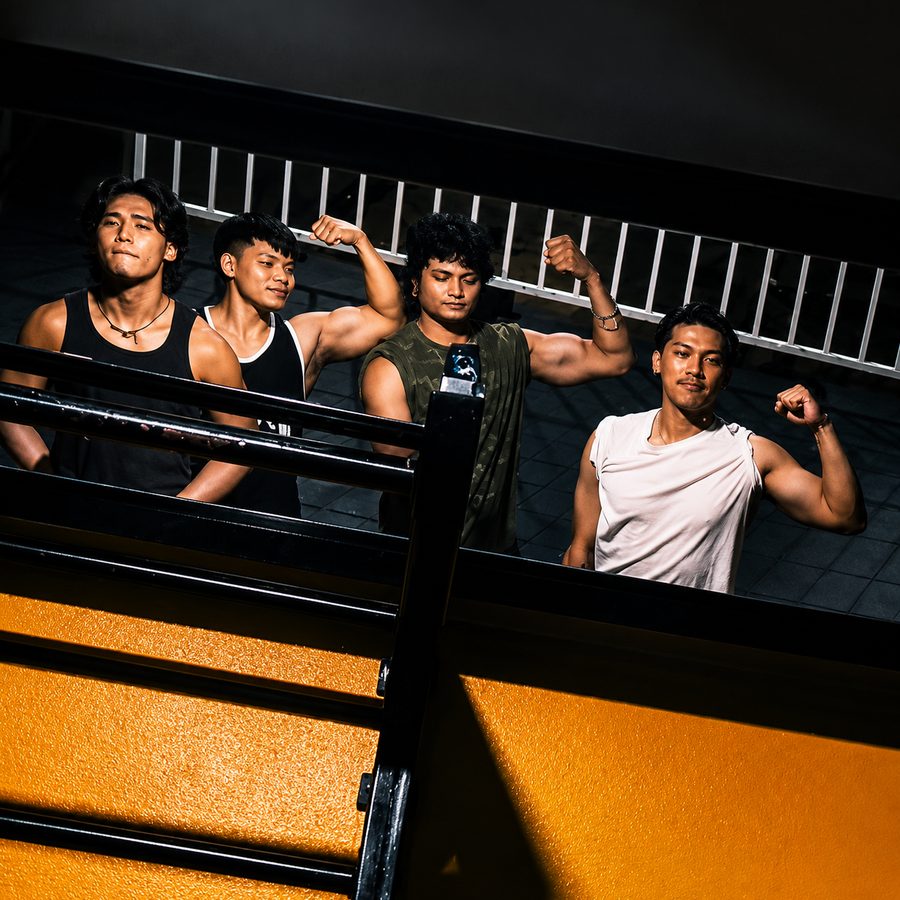Members flexing together on the stairwell